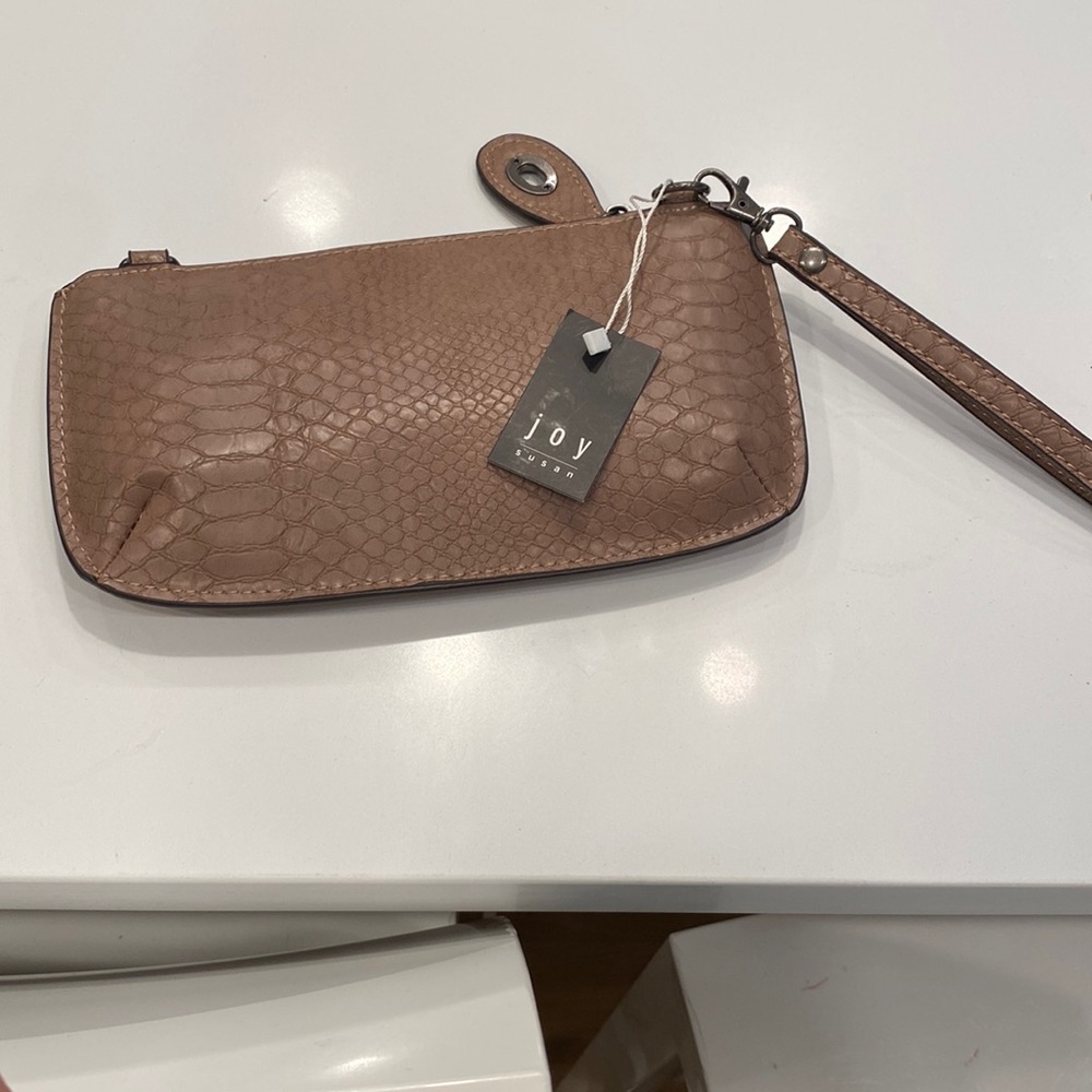 Never used small bag with attachable long strap